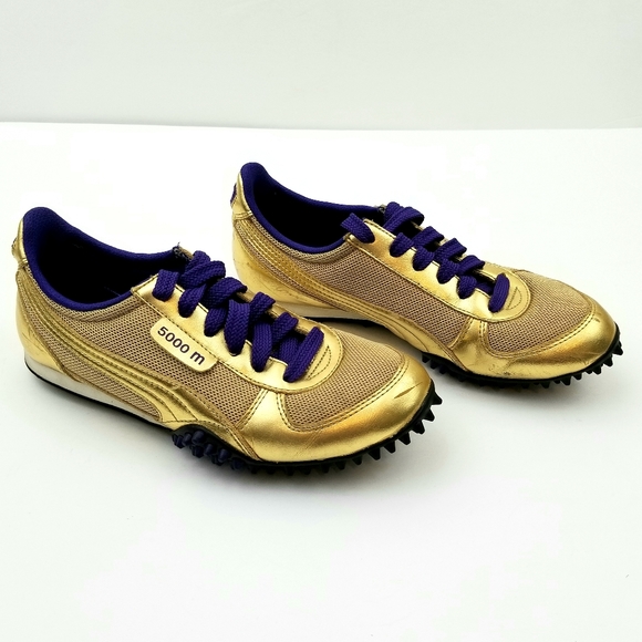 purple and gold puma shoes